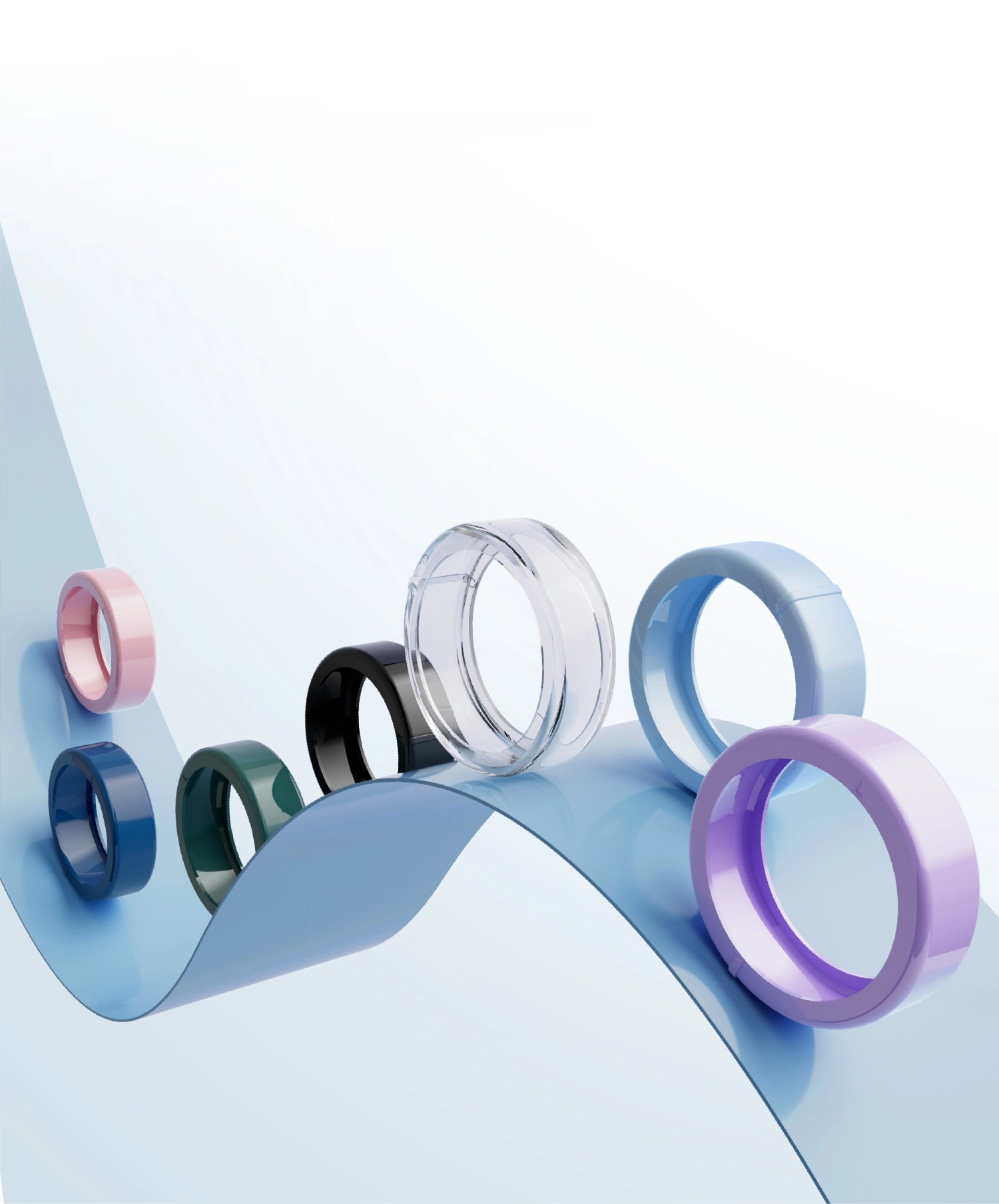 Collection of smart rings in diverse colors, showcasing modern health tracking technology.